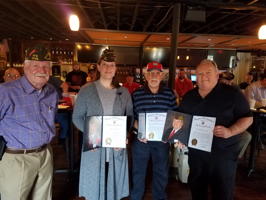 Life Saving Awards were handed out by Post Quarter Master John Marker to (from Left to Right) Hillary Collins, Hank Povinelli, Hershel Fogleman and Peter Sturdivant (not pictured).